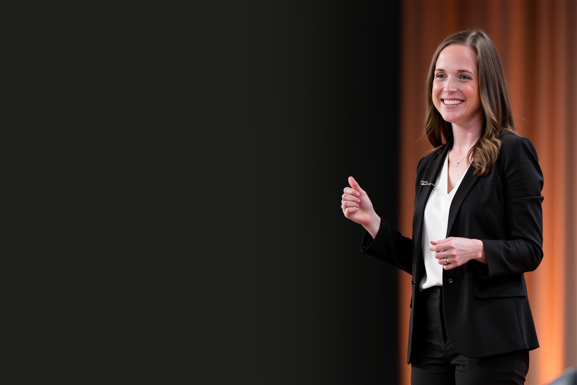 Dr. Jenny Shields speaking to an audience